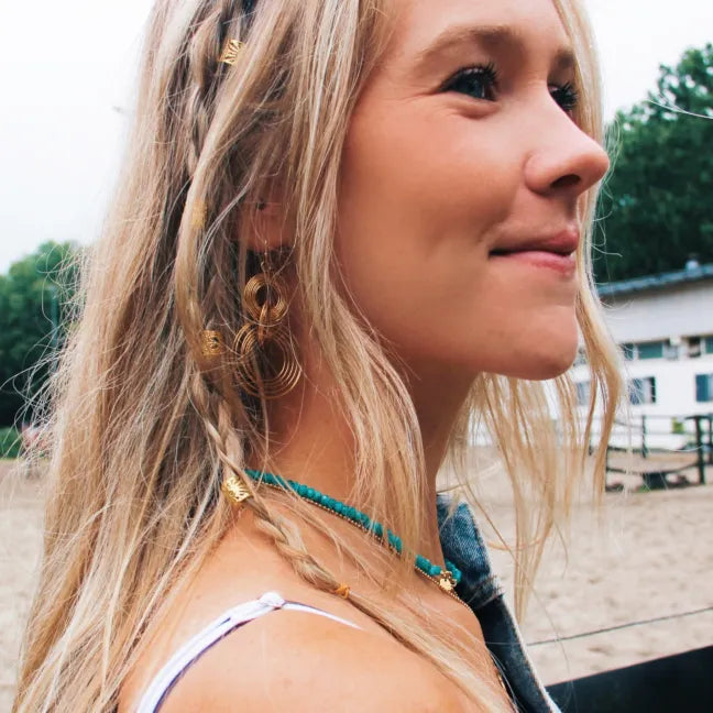 Statement oorbel twisted ringen