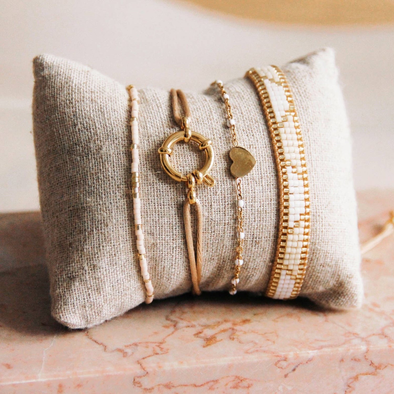 Weefarmband wit/champagne/goud